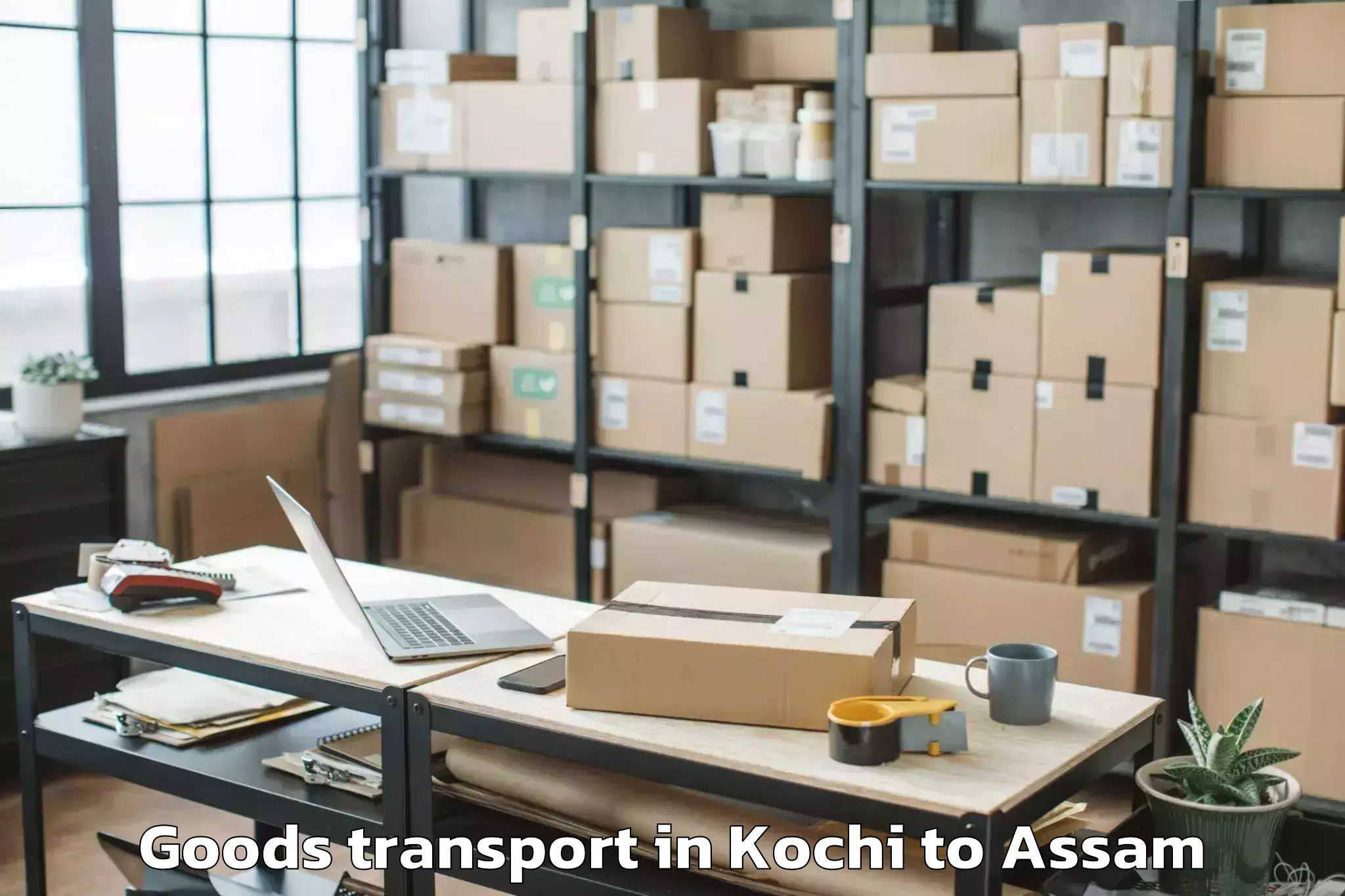 Easy Kochi to Kharupatia Goods Transport Booking